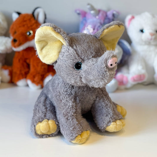 peluche éléphant gris