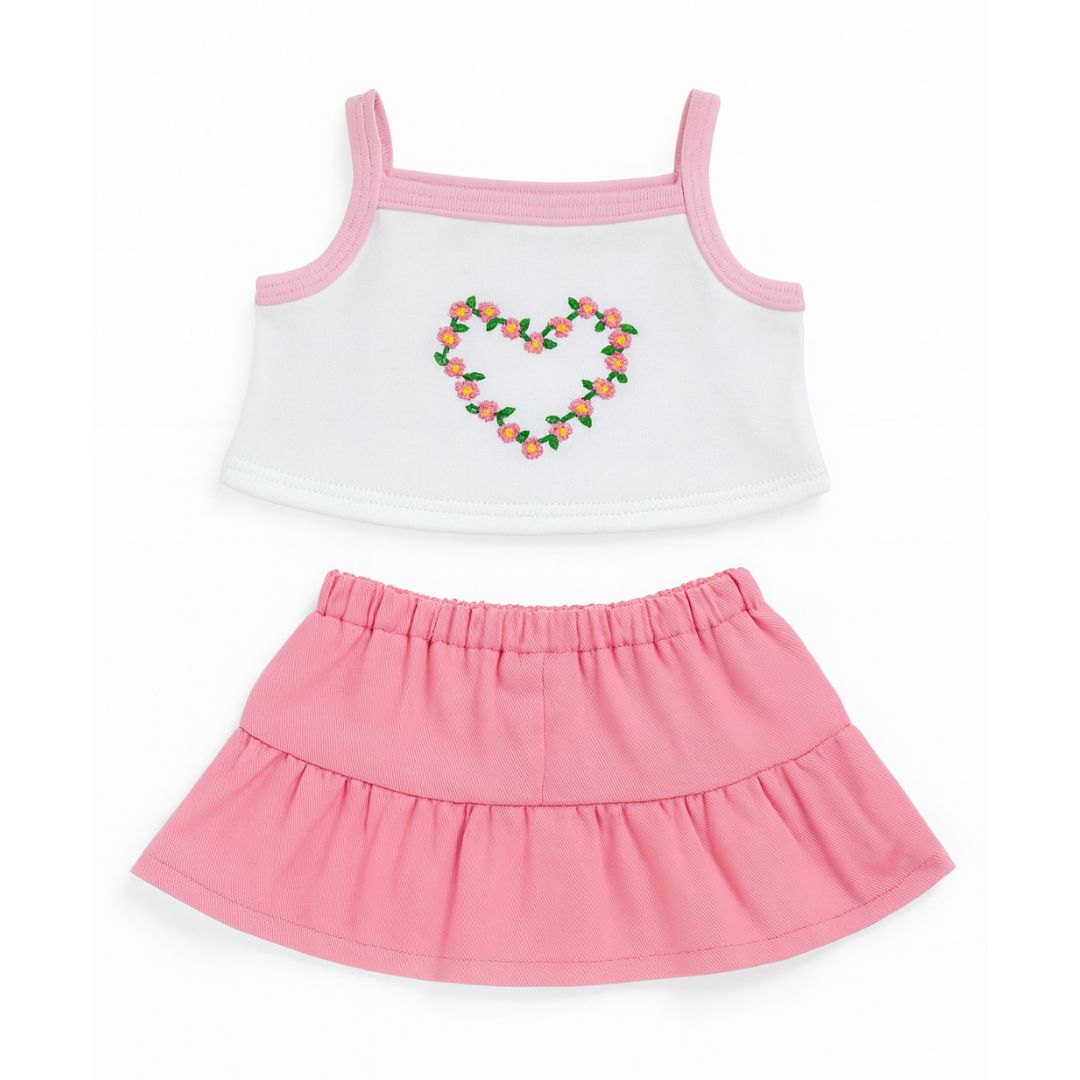 Tenue Jupe rose et Top blanc avec son cœur en fleurs